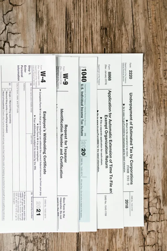 Tax forms and paperwork on a small business owner's desk in Australia