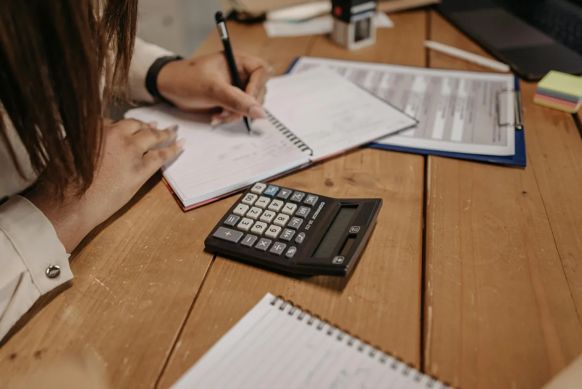 Australian small business owner reviewing BAS paperwork and considering compliance risk