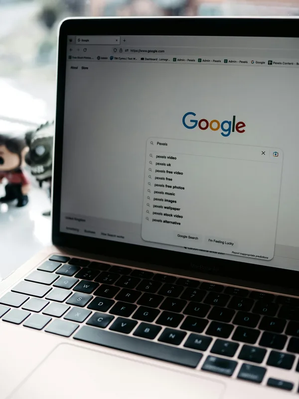 Australian small business owner using a laptop to search a public register and verify a BAS agent